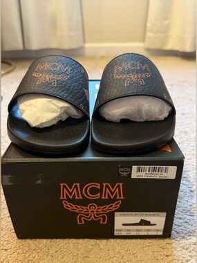MCM Black Logo Slide Sandals with Orange Accents